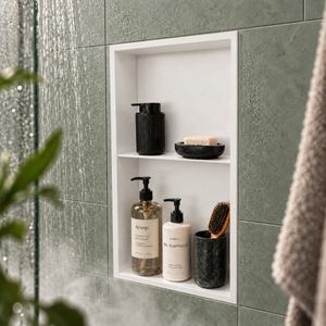 Acia wall niche, 24 × 12 in, matte white, recessed in a shower wall, bottles and soap stored inside