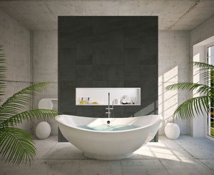Alba wall niche, 12 × 48 in, matte white, in a dark tile wall behind an oval tub surrounded by plants