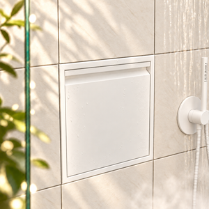 Door niche, 12 × 12 in, matte white, door closed, recessed in a bathroom wall