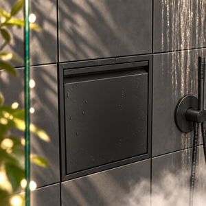 Door niche, 12 × 12 in, matte black, door closed, recessed in a bathroom wall