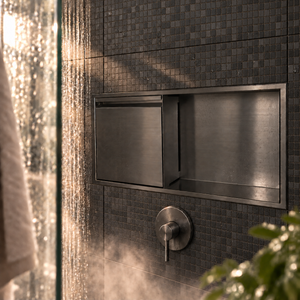 Door niche, 12 × 24 in, black PVD, empty open compartment and closed door, in a shower wall