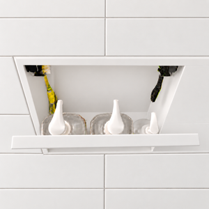 Inside view of the door niche, 12 × 48 in, matte white, door open: bottles stored in the compartment
