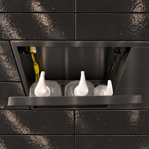 Inside view of the door niche, 12 × 48 in, matte black, door open: bottles stored in the compartment