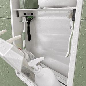 Close-up of the inside of the door niche, 24 × 12 in door, glossy white: hooks holding a razor, a toothbrush and a bottle
