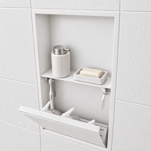 Door niche, 24 × 12 in, matte white, tilt-down door open: toiletries stored inside