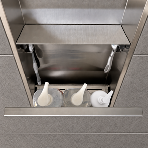 Inside view of the door niche, 24 × 12 in, brushed stainless steel, door open: bottles stored in the compartment