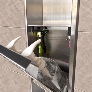 Close-up of the inside of the door niche, 36 × 8 in door, brushed stainless steel: hooks holding a razor, a toothbrush and a bottle