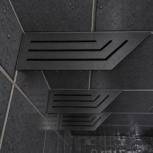 Corner shelf, 4 × 12 in, matte black, close view, with the two smaller shelves below, in a tiled shower