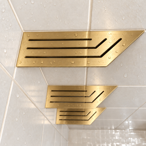 Corner shelf, 4 × 12 in, gold PVD, close view, with the two smaller shelves below, in a tiled shower