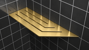 Corner shelf, 4 × 12 in, gold PVD, mounted in the corner of a tiled wall