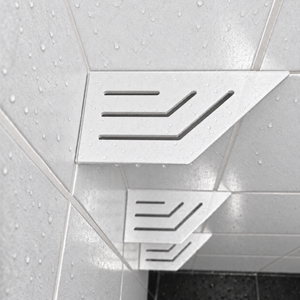 Corner shelf, 4 × 8 in, matte white, close view, with the two lower shelves, in a tiled shower