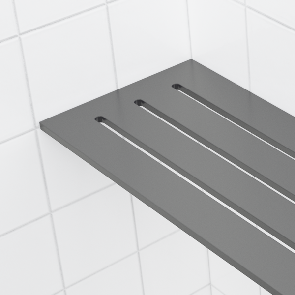 Three slots, seen close up on the 4 × 8 in corner shelf in matte grey, with white tile behind.