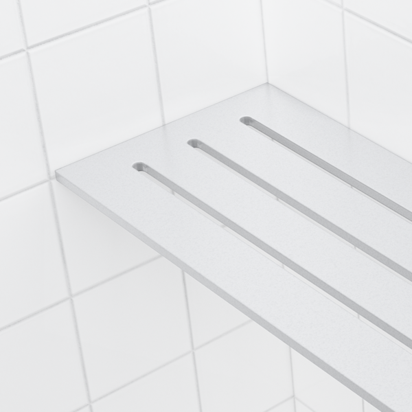 Seen close up, the matte white 4 × 8 in corner shelf has a grainy top with no shine.