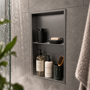 Acia wall niche, 24 × 12 in, matte gray, recessed in a shower wall, bottles and soap stored inside