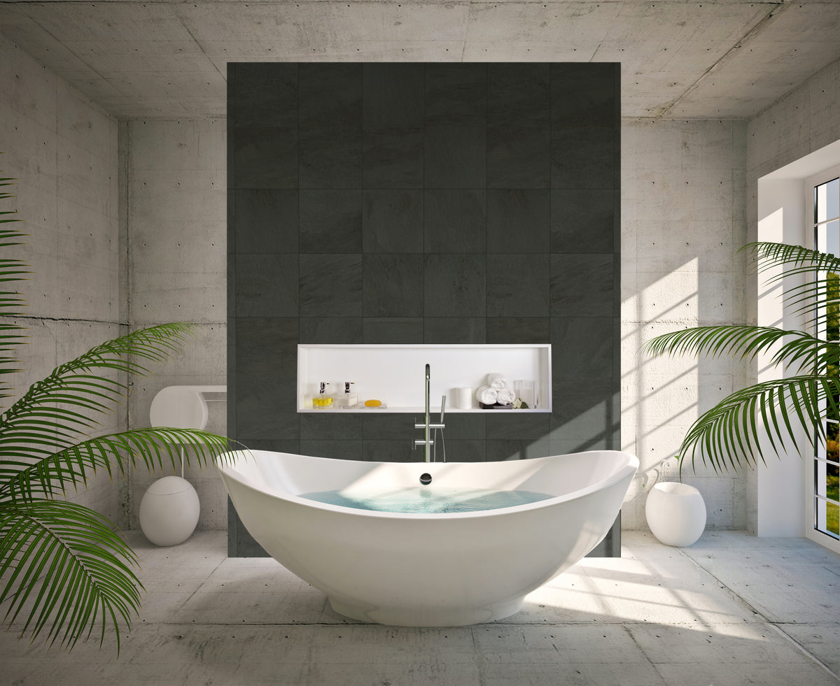Alba wall niche, 12 × 48 in, matte white, in a dark tile wall behind an oval tub surrounded by plants
