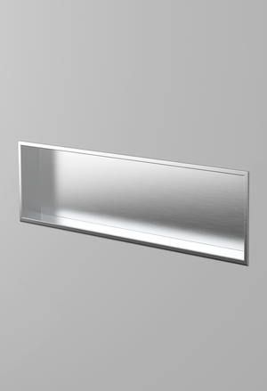 Alba wall niche, 12 × 48 in, brushed stainless steel, recessed in a plain gray wall, three-quarter view
