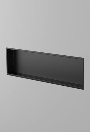 Alba wall niche, 12 × 48 in, matte black, recessed in a plain gray wall, three-quarter view