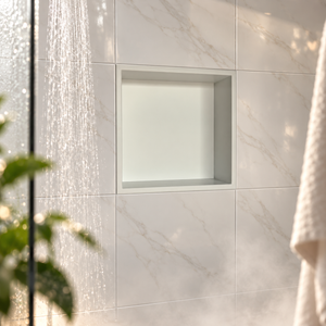 Ally wall niche, 12 × 12 in, matte white, recessed in a shower wall, empty