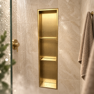 Ana wall niche, 36 × 8 in, gold PVD, recessed in a shower wall, empty