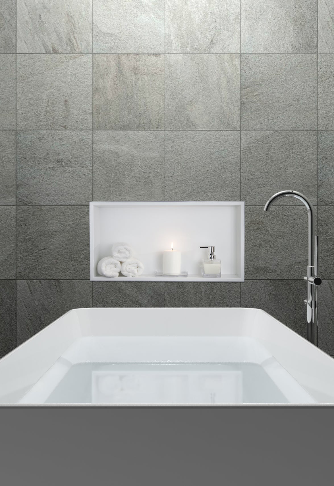 Andy wall niche, 12 × 24 in, matte white, in a gray tile wall above a tub and a freestanding faucet