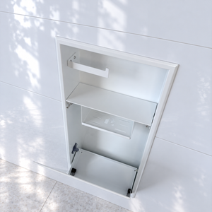 Intérieur de la niche WC blanc lustré 24 × 10,5 po vu de face, porte basculée : support à papier, tablette et compartiment du bas
