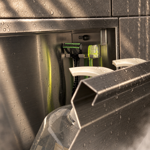 Close-up of the inside of the door niche, 12 × 12 in door, black PVD: hooks holding a razor, a toothbrush and a bottle