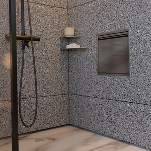Door niche, 12 × 12 in, black PVD, door closed, in a terrazzo shower wall next to two corner shelves