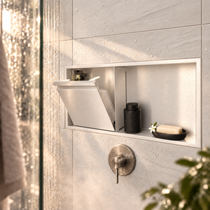 Door niche, 12 × 24 in, matte white, tilt-down door open: bottles, soap and accessories stored
