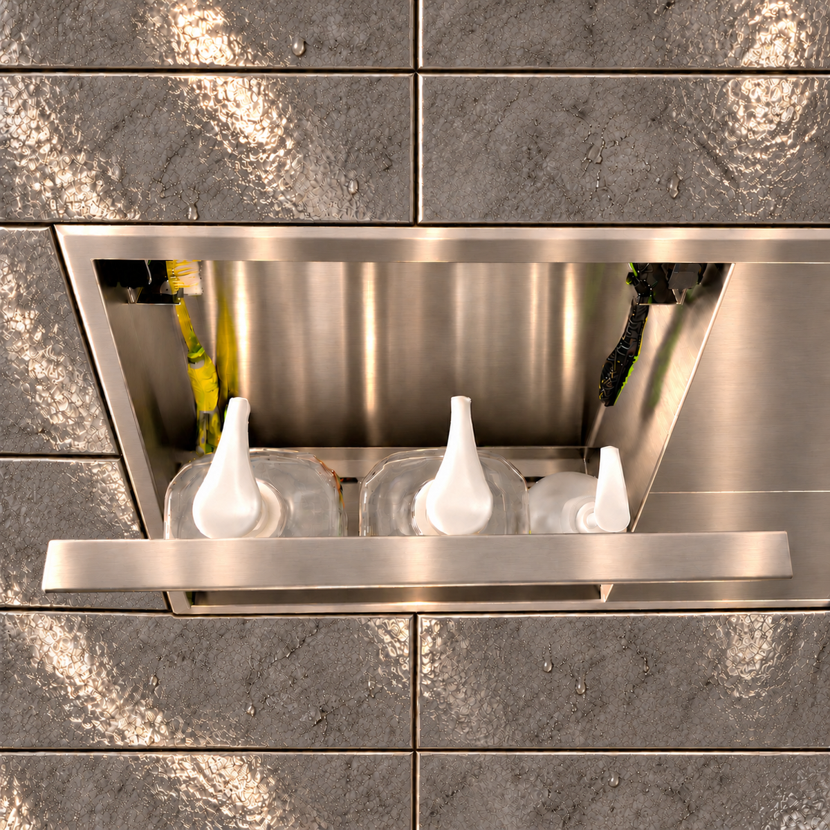 Inside view of the door niche, 12 × 24 in, brushed stainless steel, door open: bottles stored in the compartment