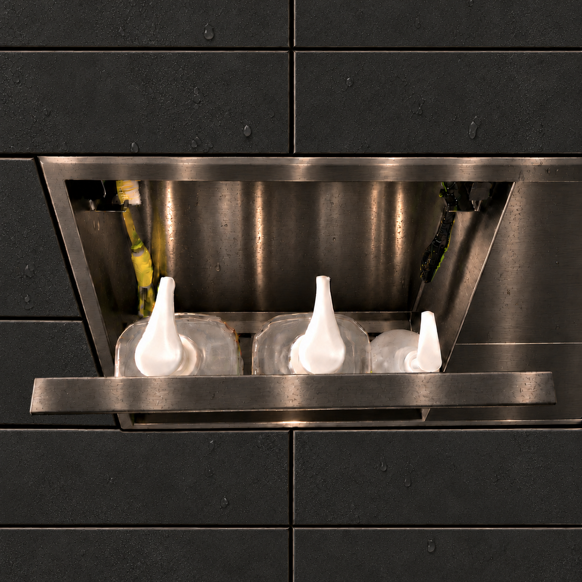 Inside view of the door niche, 12 × 24 in, black PVD, door open: bottles stored in the compartment