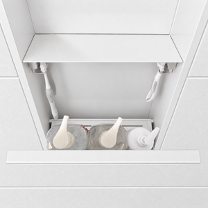 Inside view of the door niche, 24 × 12 in, matte white, door open: bottles stored in the compartment