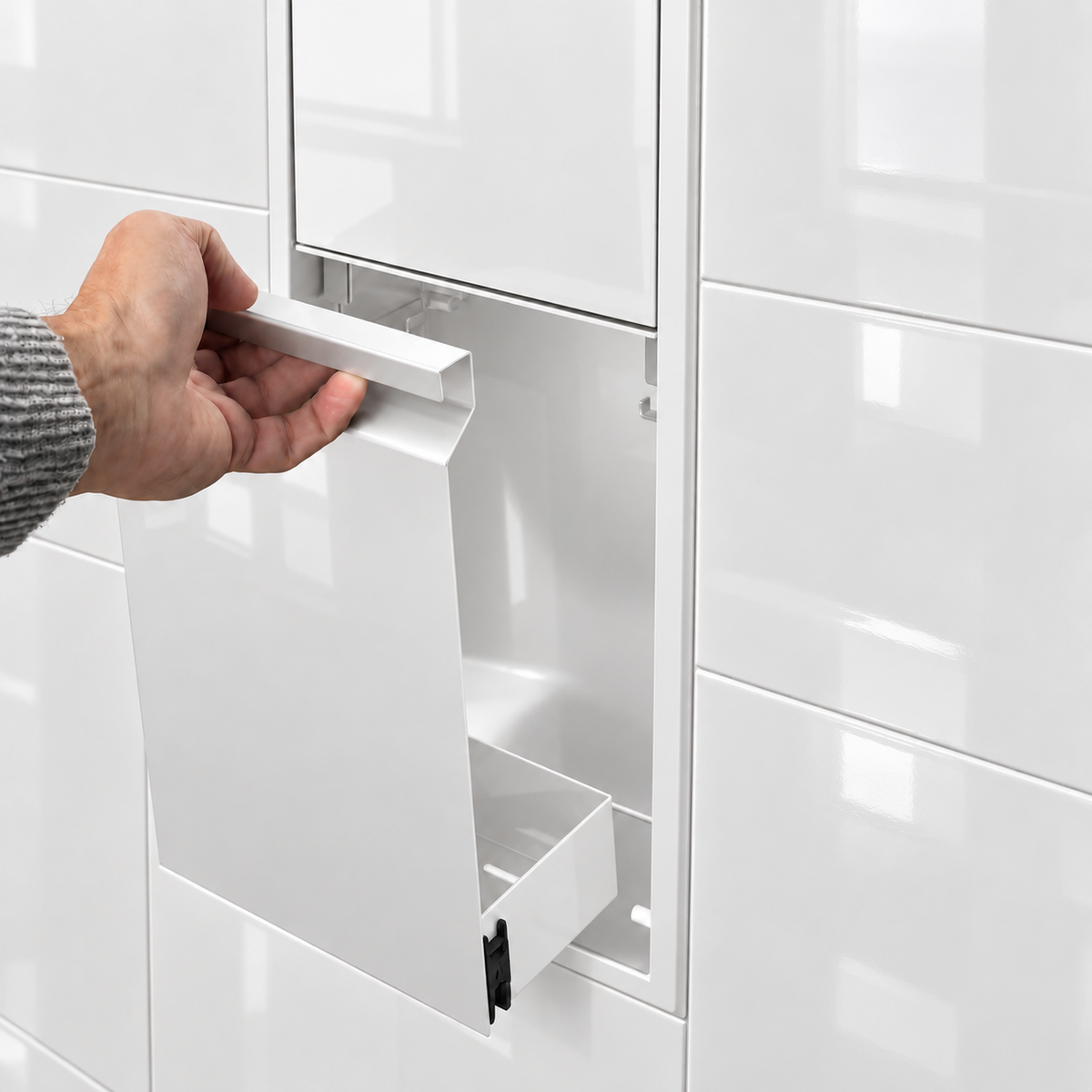 A hand lifts the removable door off the door niche, 36 × 8 in, glossy white