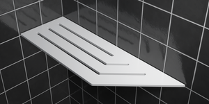 Corner shelf, 4 × 12 in, matte white, mounted in the corner of a tiled wall