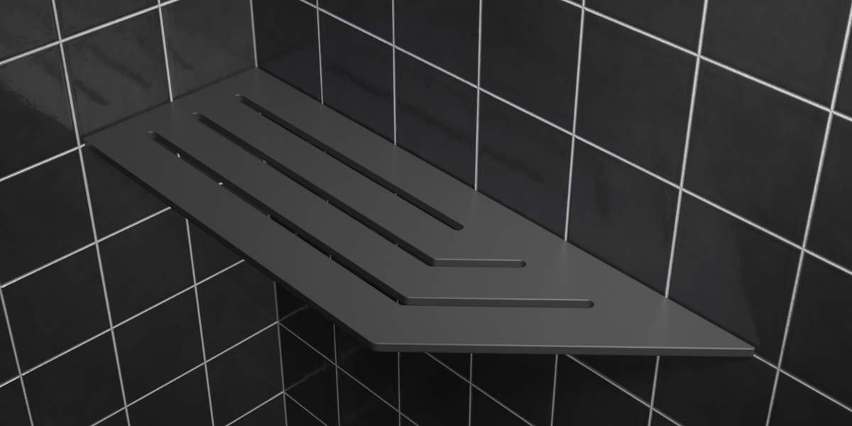 Corner shelf, 4 × 12 in, matte gray, mounted in the corner of a tiled wall