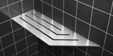 Corner shelf, 4 × 12 in, brushed stainless steel, mounted in the corner of a tiled wall