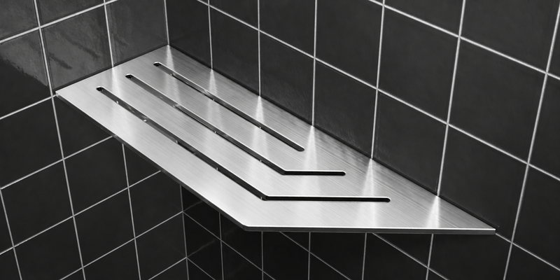 Corner shelf, 4 × 12 in, brushed stainless steel, mounted in the corner of a tiled wall