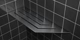 Corner shelf, 4 × 12 in, black PVD, mounted in the corner of a tiled wall