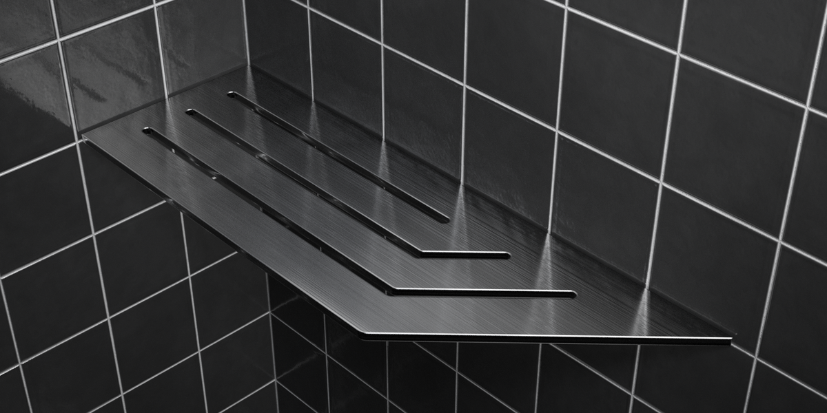 Corner shelf, 4 × 12 in, black PVD, mounted in the corner of a tiled wall