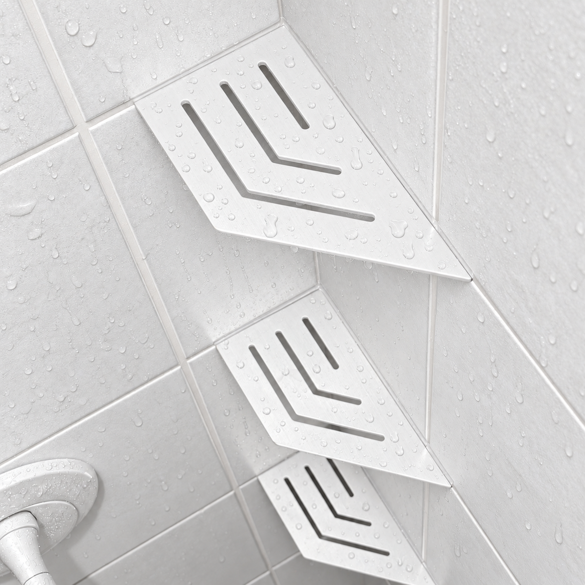Corner shelf, 4 × 8 in, matte white, angled view, with two more shelves below, in a tiled shower