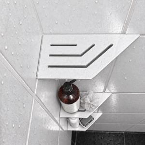 Corner shelf, 4 × 8 in, matte white, bottle and shower puff on the lower shelves, in a tiled shower