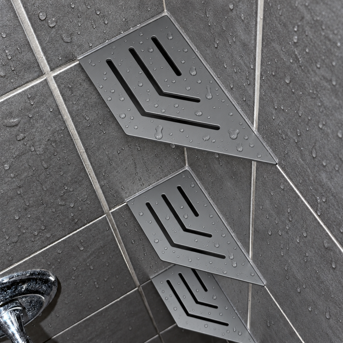Corner shelf, 4 × 8 in, matte gray, in the corner of a tiled shower, two smaller shelves below