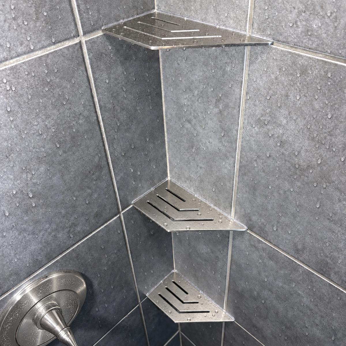 Corner shelf, 4 × 8 in, brushed stainless steel, in the corner of a tiled shower, two smaller shelves below