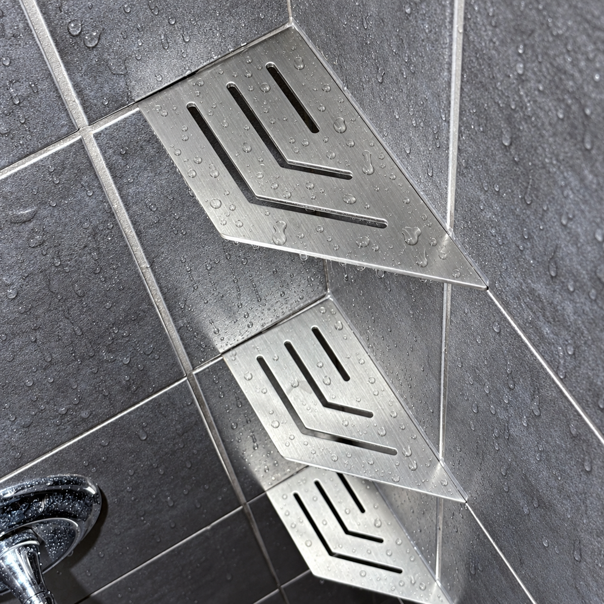 Corner shelf, 4 × 8 in, brushed stainless steel, angled view, with two more shelves below, in a tiled shower