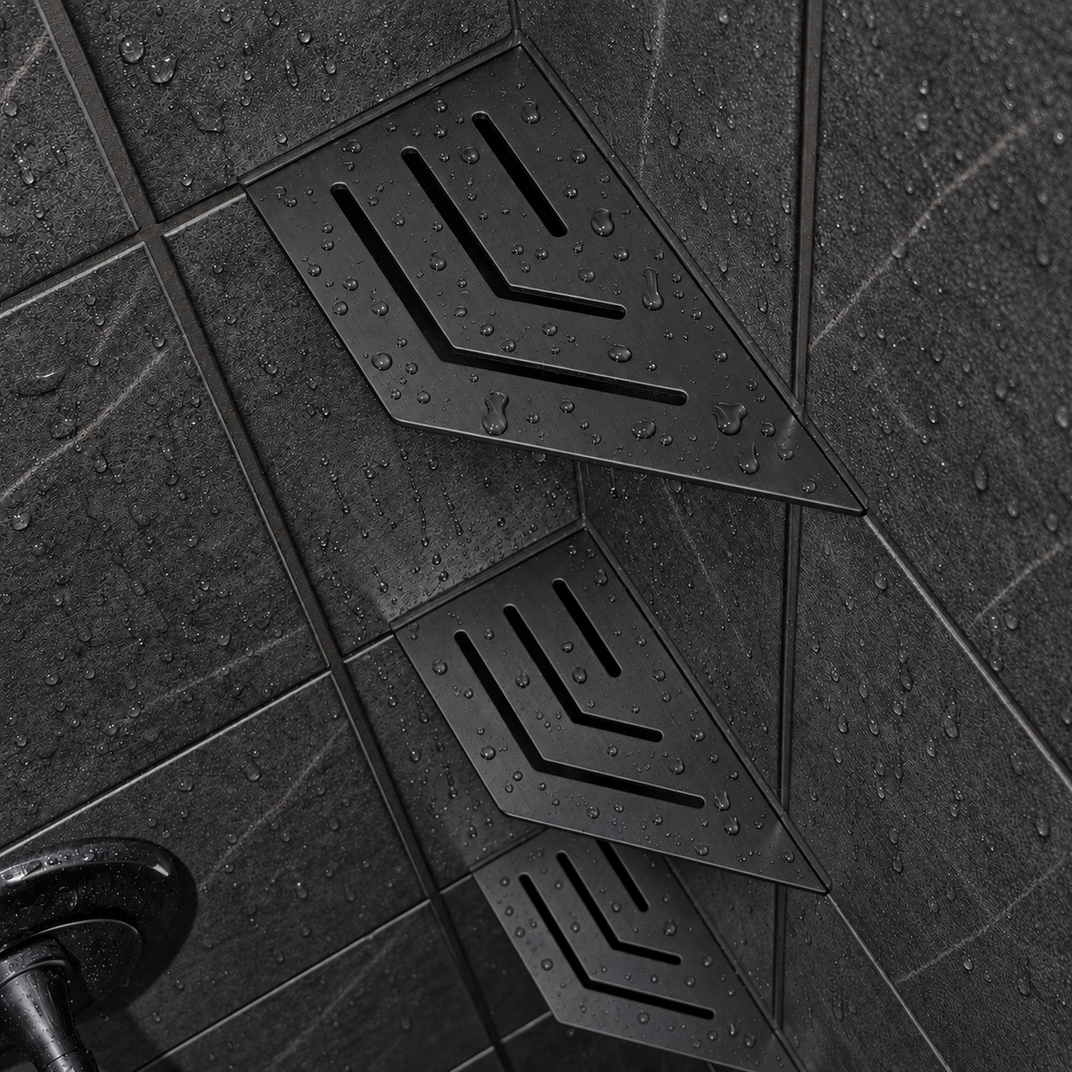 Corner shelf, 4 × 8 in, matte black, angled view, with two more shelves below, in a tiled shower