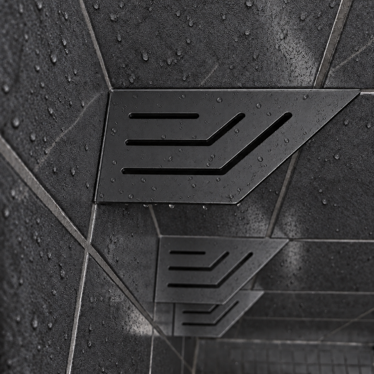 Corner shelf, 4 × 8 in, matte black, close view, with the two lower shelves, in a tiled shower