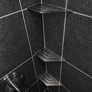 Corner shelf, 4 × 8 in, black PVD, in the corner of a tiled shower, two smaller shelves below