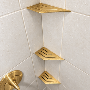 Corner shelf, 4 × 8 in, gold PVD, in the corner of a tiled shower, two smaller shelves below
